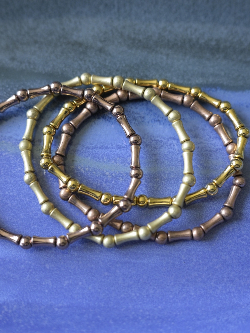 Tri-Tone Metal 'Bamboo' Bead Stretch Bracelets - Gold, Bronze, Pale Gold